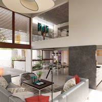 Sala contempor&aacute;nea de doble altura con comedor integrado, celos&iacute;as de madera y luz natural cenital