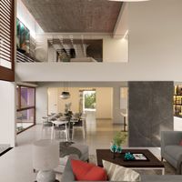 Sala contemporánea de doble altura con comedor integrado, celosías de madera y luz natural cenital